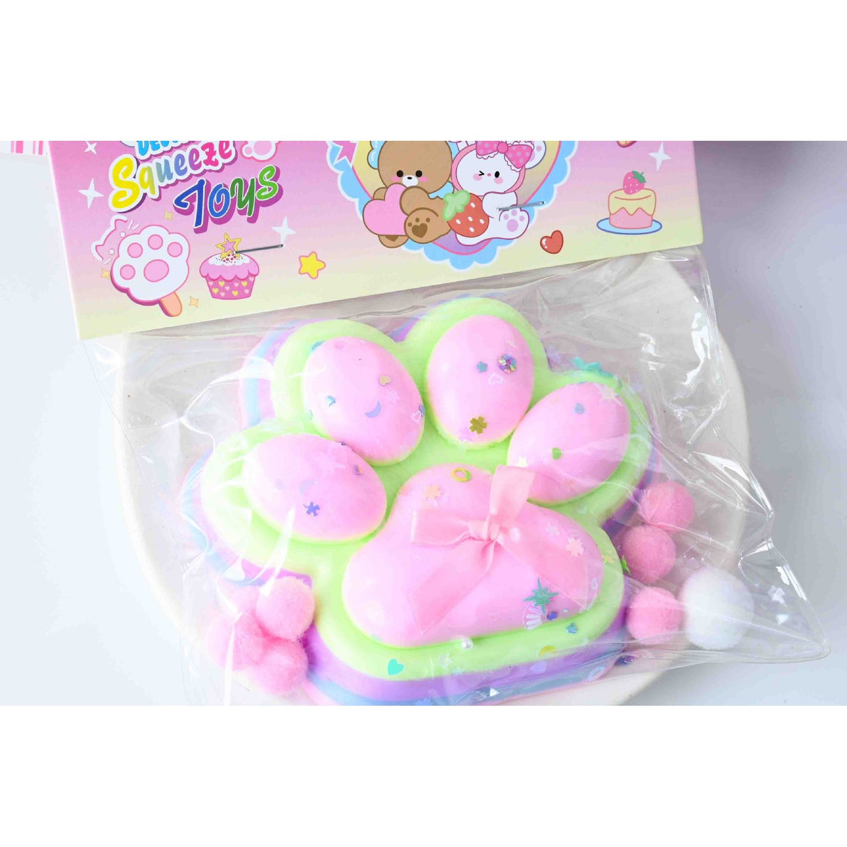 Jucarie Antistres Squishy, Vivimall, cu Revenire Lenta, Model Labuta de Pisica YY1005, 220g, 12.5 x 10.5 cm, Squeeze Pinch Family, Ambalaj Transparent, Roz-Curcubeu - vivimall.ro