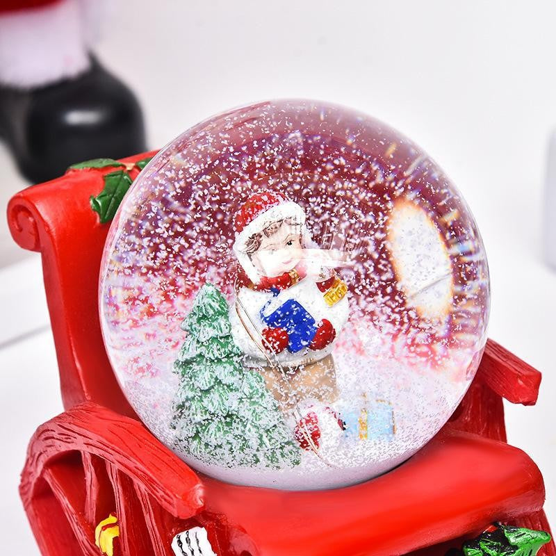 Decoratiune muzicala glob cu zapada, cu lumini si muzica, Mos Craciun, forma scaun, 13 cm, multicolor - vivimall.ro