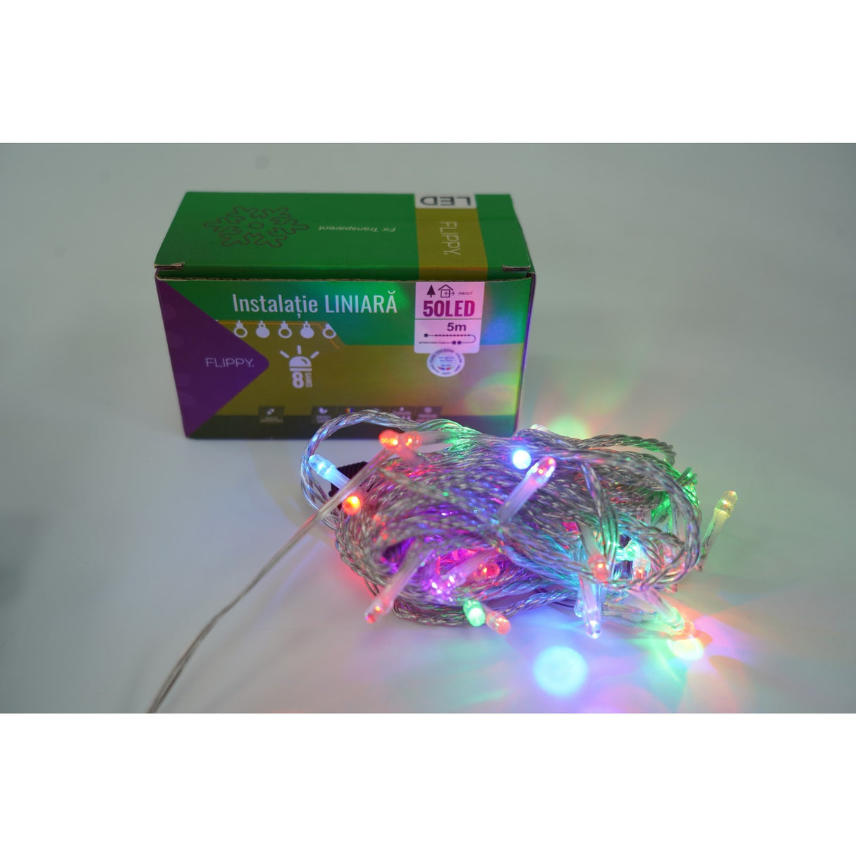 Instalatie Craciun, 55 m, 550 Led-uri ,Liniara, Rosu/Albastru/Rosu/Verde, Flash, Transformator cu telecomanda, Interconectabila, Prelungitor 5 m inclus, Fir Verde, Flippy - vivimall.ro