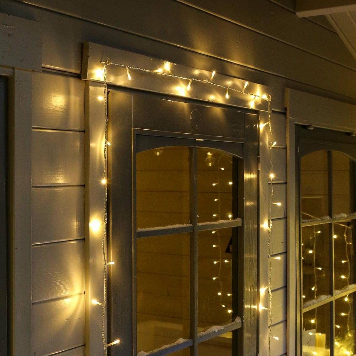 Instalatie Craciun, 65 m, 650 Led-uri ,Liniara, Alb cald, 8 jocuri de lumini, Transformator cu telecomanda, Interconectabila, Prelungitor 5 m inclus, Fir Transparent, Vivimall - vivimall.ro