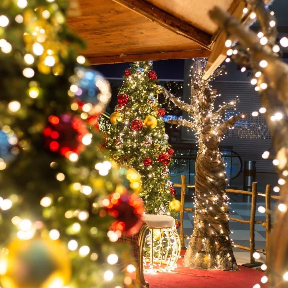 Instalatie de Craciun liniara Yoto, 10 m, din care 1 m cablu priza 220V, 100 LED, 8 jocuri de lumini, beculet in 6 colturi, pentru interior, controler, fir negru, alb cald - vivimall.ro