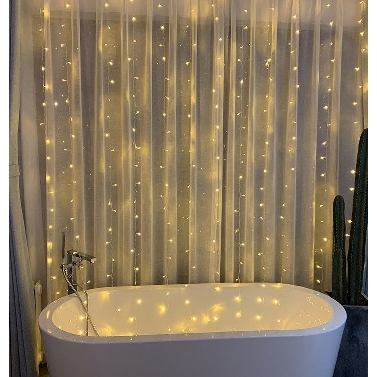 Instalatie Craciun, Tip Perdea, IP44, 6 m x 2 m, 720 LED-uri, Alb cald, 8 jocuri de lumini, Transformator cu telecomanda, Interconectabila, Prelungitor 3 m inclus, Fir transparent, Interior/ Exterior, Vivimall - vivimall.ro