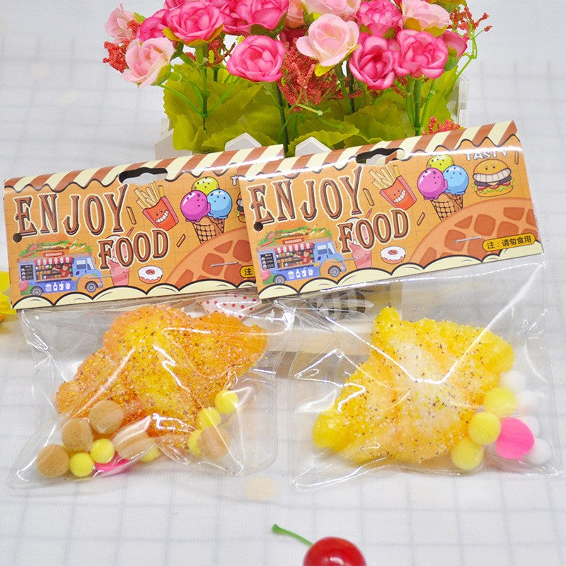 Jucarie Antistres Squishy, Vivimall, cu Revenire Lenta, Squeeze Pinch Family, Model Croissant, 10x8 cm, 90g, Ambalaj Transparent, Maro - vivimall.ro