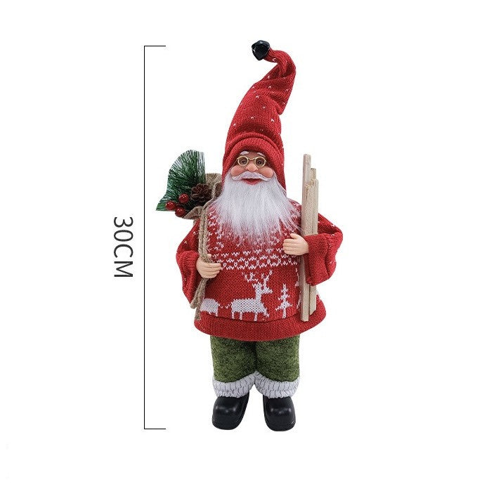 Figurina Decorativa Craciun, Vivimall, Mos Craciun cu Lemne la Brat, 30 x 17 x 10 cm, Material Plastic+Textil, Interior/Exterior, Rosu/Verde - vivimall.ro