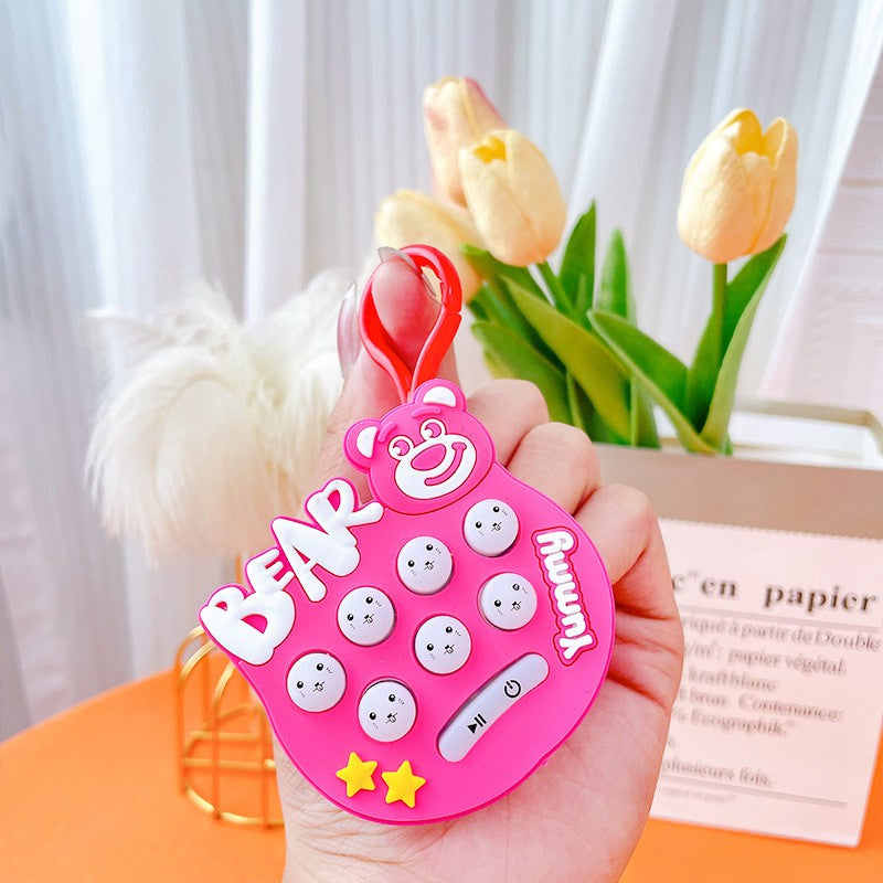 Jucarie pentru copii portabila Vivimall, joc Gopher, cu lumini si muzica, tip breloc, model ursulet, material silicon si ABS, roz - vivimall.ro