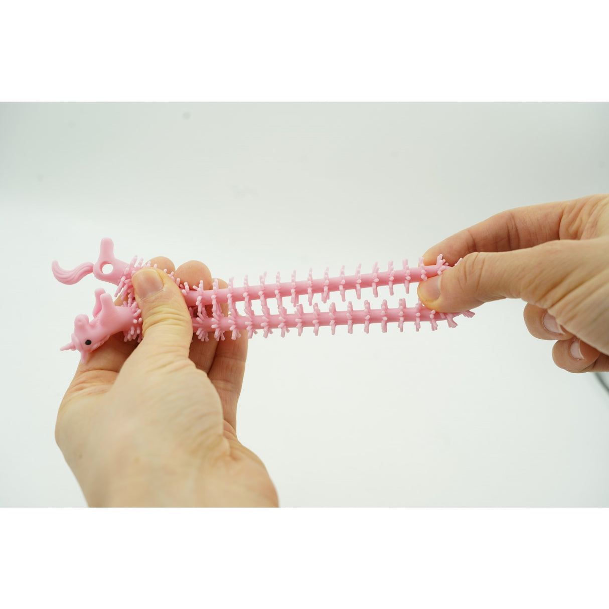 Jucarie senzoriala superelastica, antistres, Fidget toy, Unicorn noodles, Roz deschis - vivimall.ro