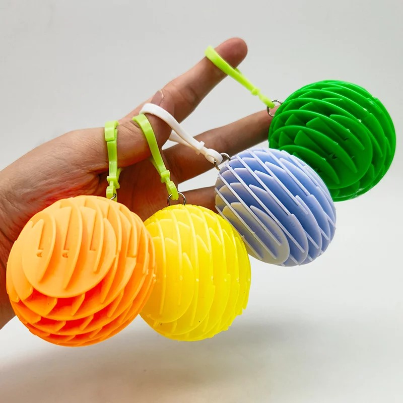 Jucarie Worm Fidget de Decompresie, Vivimall, Anti Stres, Dimensiune Compacta 6 cm, Dimensiune Extinsa 15.5 cm, Albastru eschis - vivimall.ro