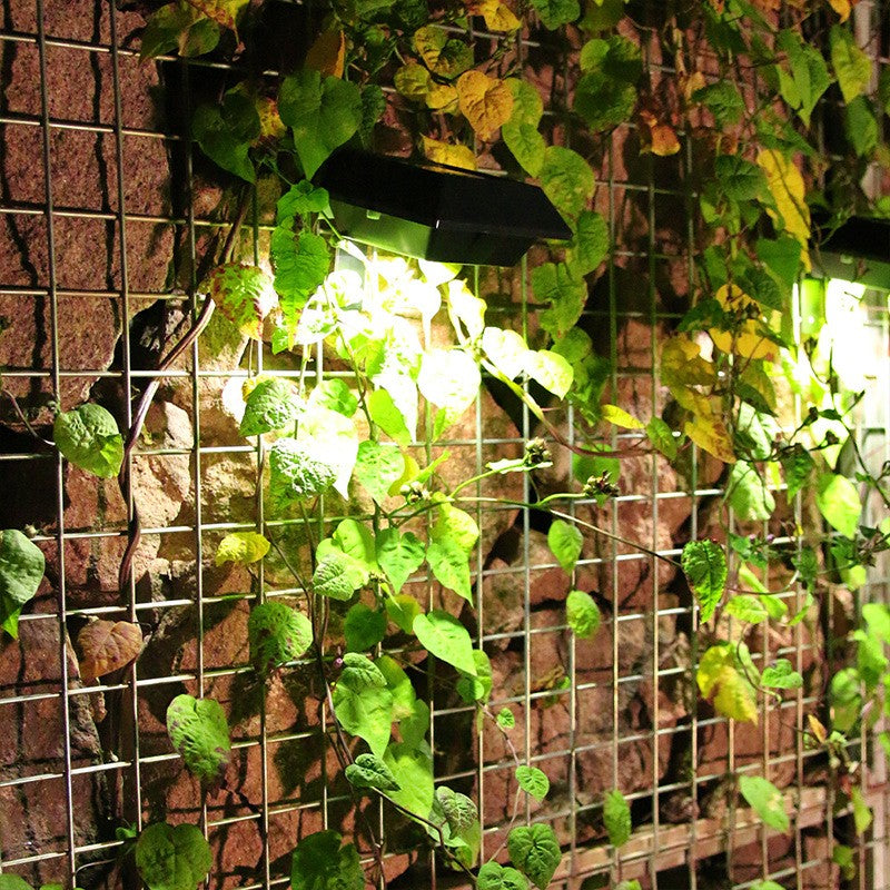 Lampa solara LED pentru gradina/scari/balustrade Vivimall, 3.7V, ABS, 1200mAh, 12 x 6 cm, 12 LED-uri SMD, lumina alb cald, carcasa neagra - vivimall.ro