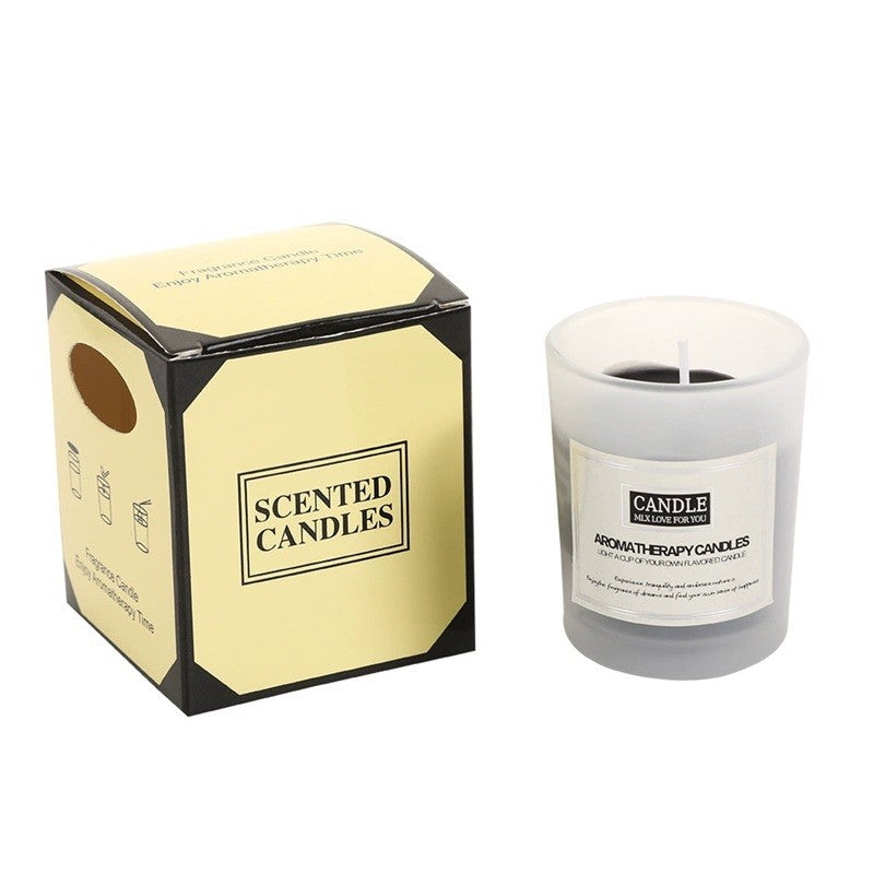 Lumânare parfumată cu aromă de lemn de santal în borcan de sticlă translucidă neagră, vedere frontală, 6.2x5.2 cm