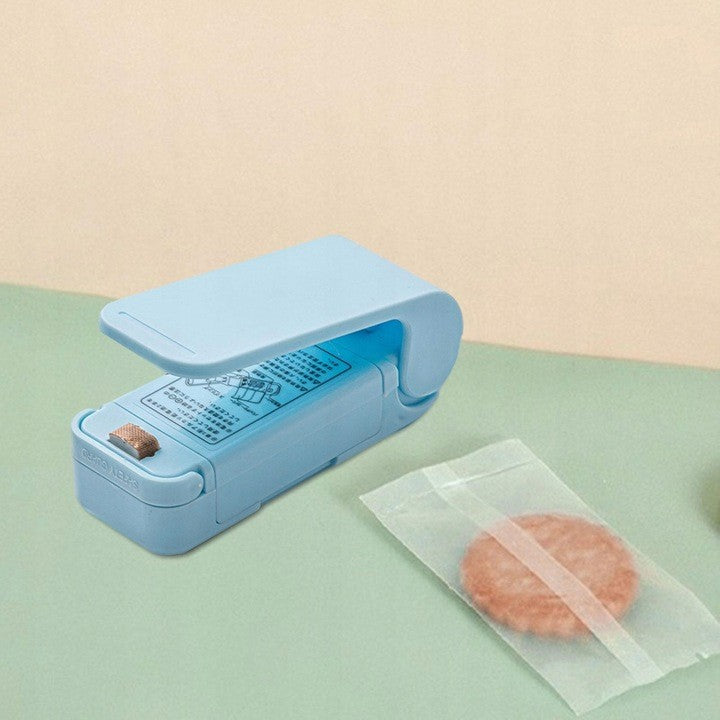 Mini Aparat de Sigilat Pungi cu Baterii, Vivimall, Etansare prin Caldura, Spate Magnetic, Portabil, 9.7x3 cm, Albastru - vivimall.ro
