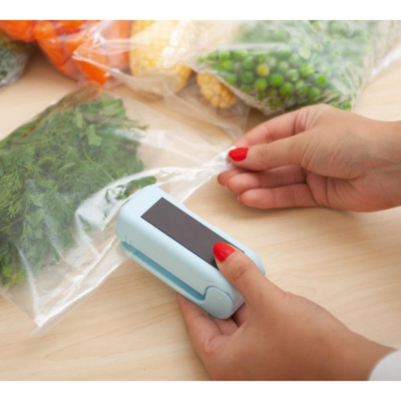 Mini Aparat de Sigilat Pungi cu Baterii, Vivimall, Etansare prin Caldura, Spate Magnetic, Portabil, 9.7x3 cm, Albastru - vivimall.ro