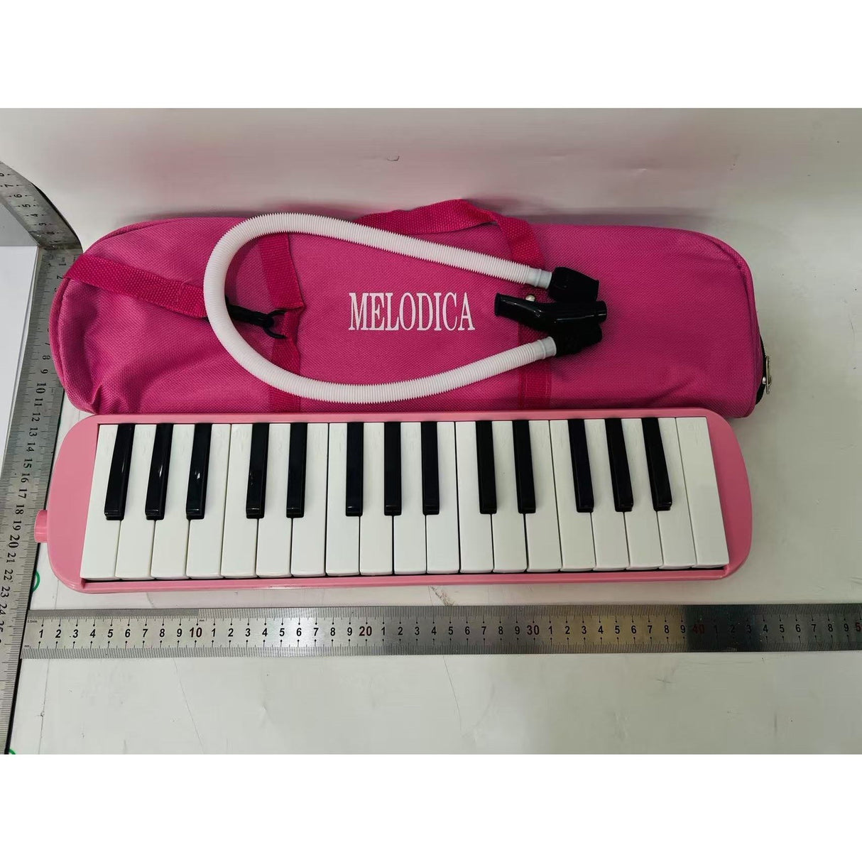 Muzicuta Melodica 32 Clape, Vivimall, din ABS, pentru Incepatori, 45 x 13 x 7 cm, Include Husa si Suflator, Roz - vivimall.ro