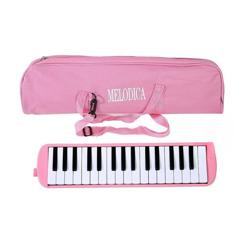 Muzicuta Melodica 32 Clape, Vivimall, din ABS, pentru Incepatori, 45 x 13 x 7 cm, Include Husa si Suflator, Roz - vivimall.ro