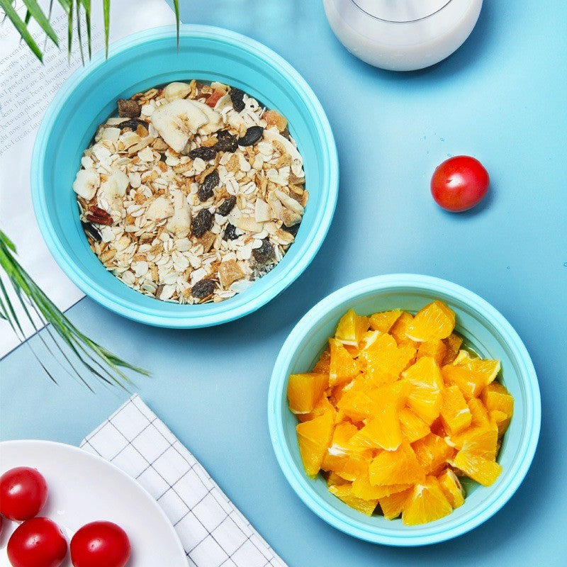 Set 2 caserole rotunde pliabile Vivimall, din silicon, rezistenta la temperaturi ridicate, usor de depozitat si curatat, 500 si 800 ml, utilizare in cuptorul cu microunde, albastra - vivimall.ro