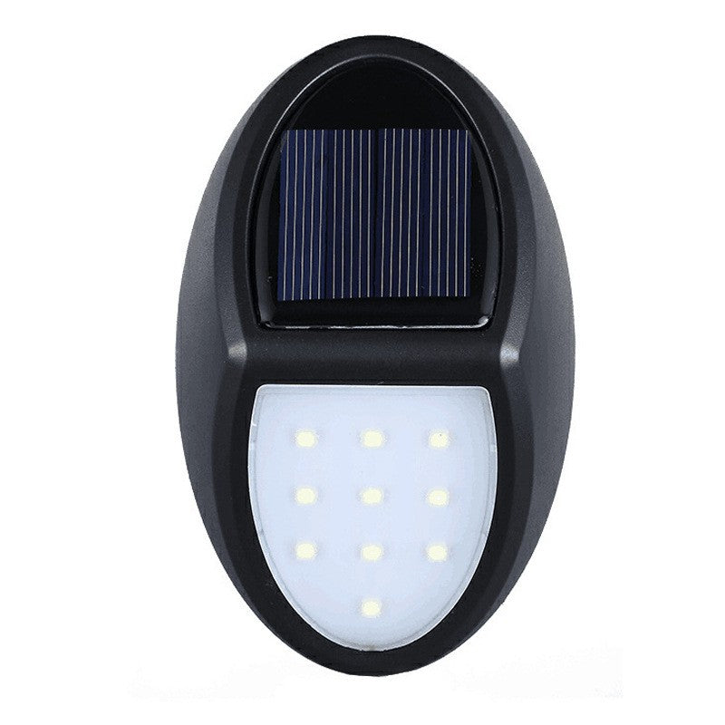 Aplica solara LED pentru perete Vivimall, in forma ovala, 10 LED-uri, lumina puternica, IP65, 12 x 7.5 cm, 1.2 V, 300 mAh, autonomie 8-10 ore, alb rece - vivimall.ro