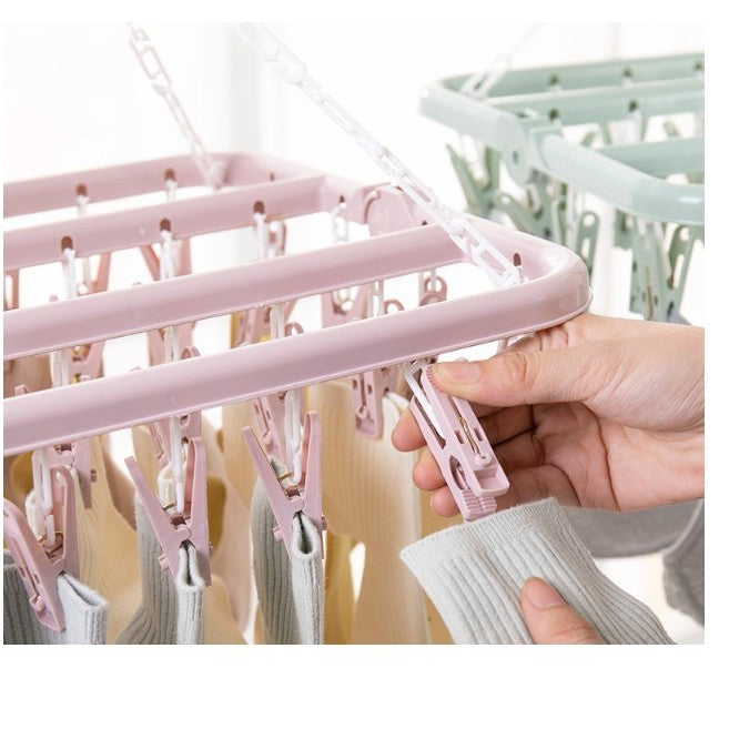 Uscator de rufe Vivimall, 32 de cleme, Plastic, Pliabil, rotire 360 grade, 32x32 cm, Roz - vivimall.ro