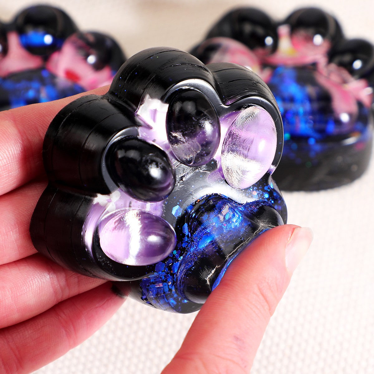 Jucarie Antistres Squishy, Vivimall, cu Revenire Lenta, Squeeze Pinch Family, Model Cat Paw, 6.5 x 6 cm, din Tpr, 4-6 Ani, Model 5 Meduze, Negru cu Insertii - vivimall.ro