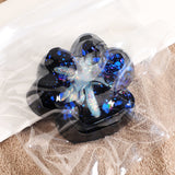 Jucarie Antistres Squishy, Vivimall, cu Revenire Lenta, Squeeze Pinch Family, Model Cat Paw, 6.5 x 6 cm, din Tpr, 4-6 Ani, Model 6 Galaxie, Negru cu Insertii - vivimall.ro