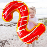 Balon din Folie Metalizata Vivimall, Figurina Cifra, Imprimeu Gogosi, Tema Aniversare 100 cm, Ambalaj Individual, Pai inclus, Umflare cu Aer sau Heliu, Multicolor, Cifra 2 - vivimall.ro