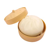 Detaliu față zâmbitoare și obraji roz ai jucăriei Squishy Flippy Chifla Aburită, material moale