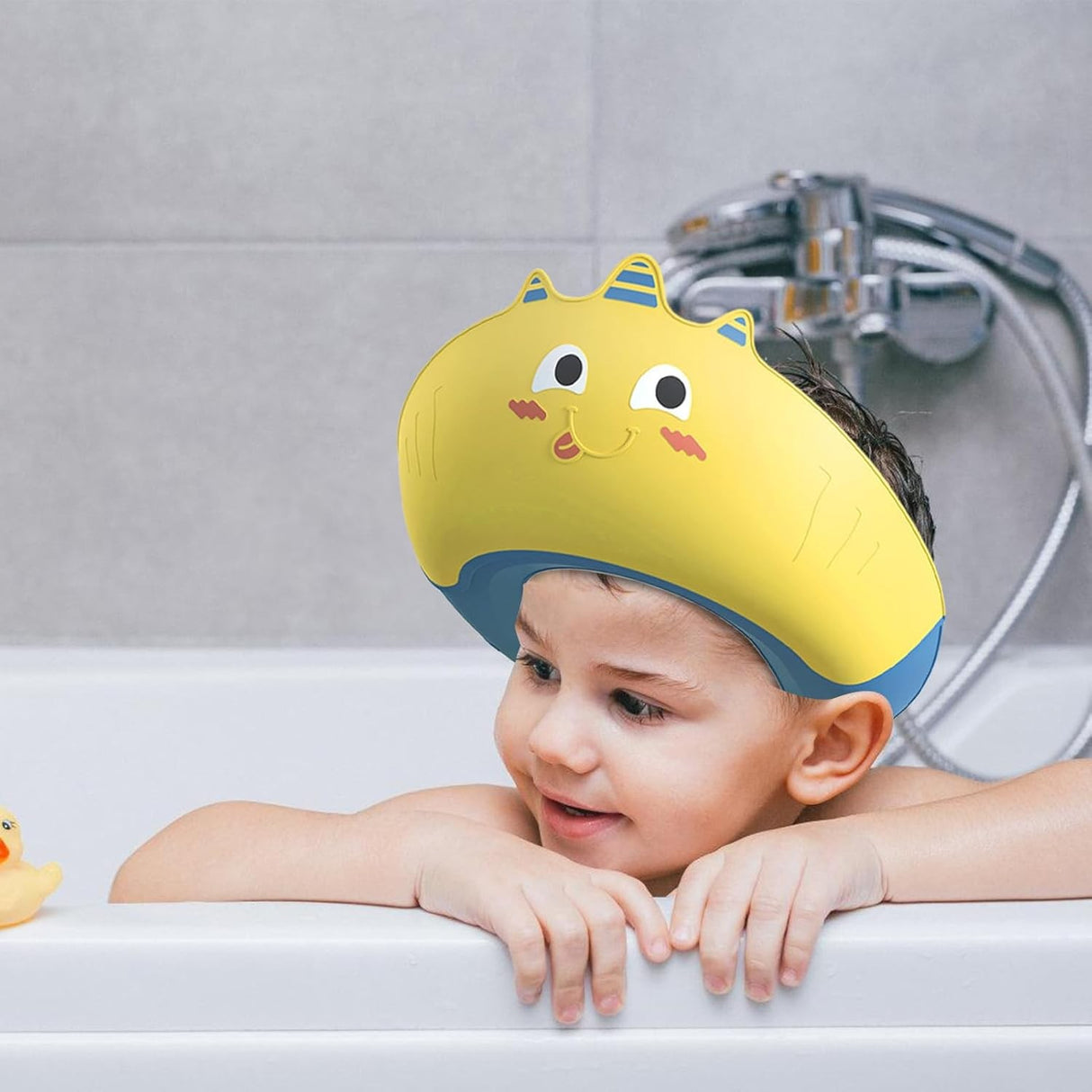 Casca de Dus, Vivimall, Previne Scurgerea Apei si Samponului pe Fata, 0-12 Ani, Ajustabila, din TPE+PP, 20 x 23 cm, Model Unicorn, Galben/Albastru - vivimall.ro
