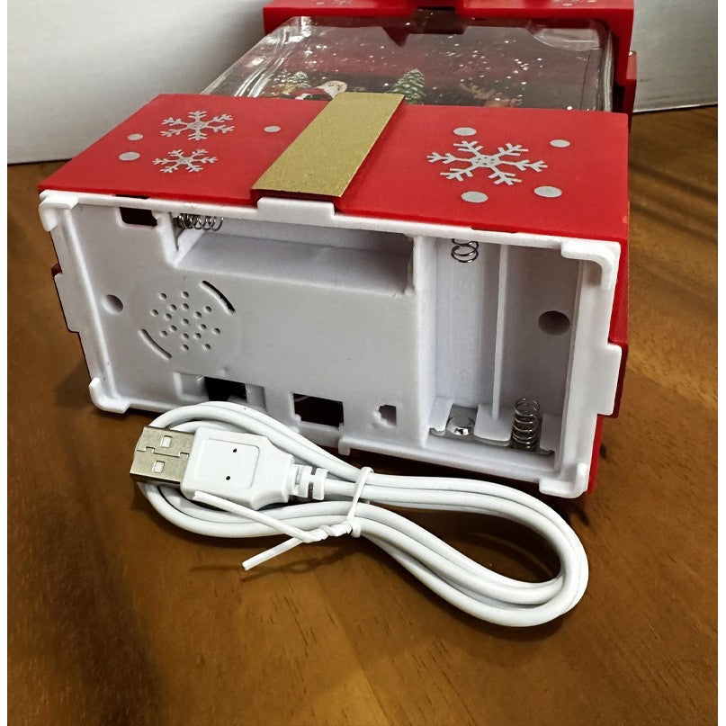 Decoratiune Craciun, Tip Cutie de Cadou, Figurine Mos Craciun cu Sania, 3 Moduri, Functie Muzicala, Zapada in Miscare, Functioneaza Cu Baterii ( 3 x AA neincluse), Cablu USB (Inclus), Model Cadou Rosu - Auriu, 13 x 9 x 19.8 cm, Alb Cald - vivimall.ro