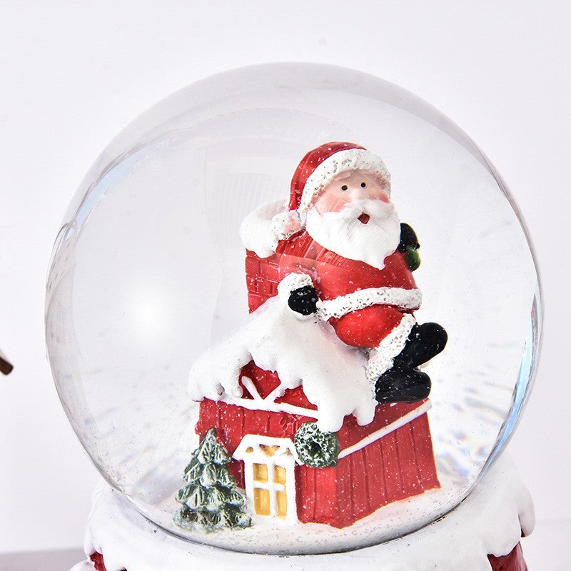 Decoratiune glob cu zapada Flippy, Mos Craciun pe casa, model 2, diametru 6.5 cm, multicolor - vivimall.ro