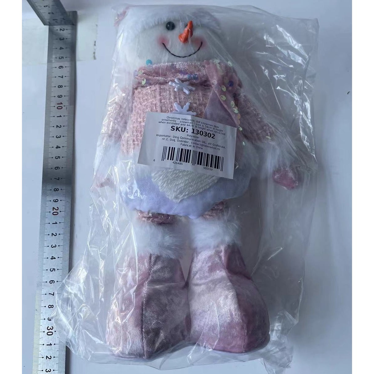 Figurina Decorativa, Pentru Craciun, Vivimall, Om de Zapada, Picioare Telescopice, Inaltime Reglabila 44-54cm, Caciula cu Paiete, Roz - vivimall.ro