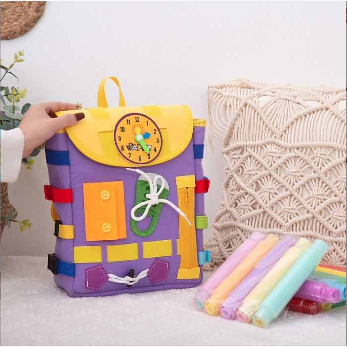 Ghiozdan Montessori, Vivimall, pentru Copii 2-6 ani, Fidget Pop, cu Catarame si Fermoare, Jucarii Senzoriale, Activitate de Invatare prin Joc, Mov, 0.25 kg, 28x10x23 cm - vivimall.ro