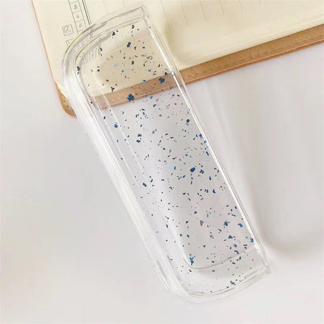 Husa Flippy pentru IQOS Iluma, de Protectie, Anti Soc si Zgarieturi, din Plastic, 12.5 x 4.2 x 2.6 cm, Transparent cu Sclipici Albastru - vivimall.ro