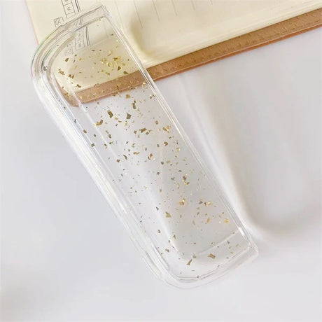 Husa Flippy pentru IQOS Iluma, de Protectie, Anti Soc si Zgarieturi, din Plastic, 12.5 x 4.2 x 2.6 cm, Transparent cu Sclipici Auriu - vivimall.ro