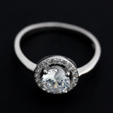 Inel tip logodna din Argint 925, zirconiu alb inconjurat de minizirconii, marimea 52