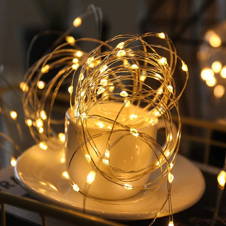 Șir luminos LED alb cald 30 metri pentru exterior, detaliu fir cupru flexibil și becuri LED