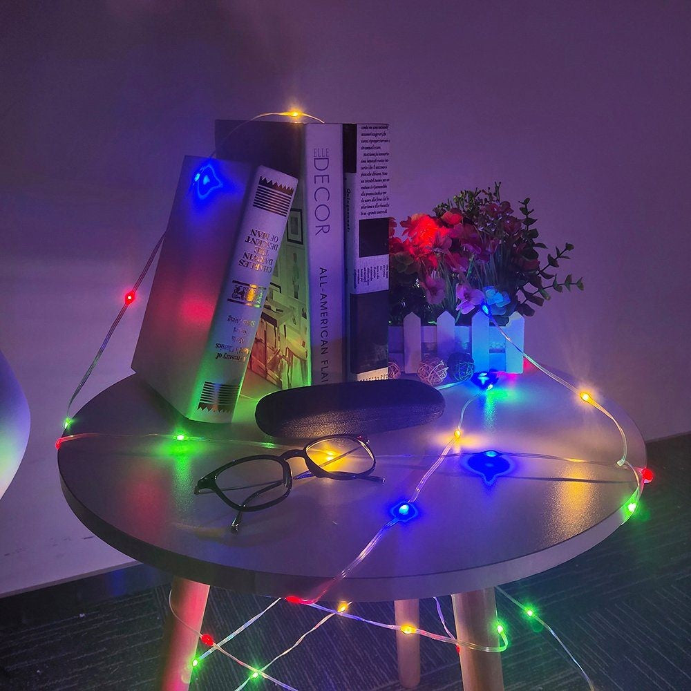 Instalatie de Craciun Vivimall, liniara, cu 200 micro LED-uri, 20 m, 220V, conectare la retea, cu 8 jocuri de lumini, interior/exterior, fir transparent, 3 fire cupru, multicolora - vivimall.ro