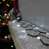 Instalatie de Craciun liniara Yoto, 17 m, din care 1 m cablu priza 220V, 200 LED, 8 jocuri de lumini, controler, fir negru, alb rece - vivimall.ro