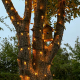 Instalatie de Craciun liniara Yoto, 24 m, din care 1 m cablu priza 220V, 300 LED, 8 jocuri de lumini, controler, fir negru, alb cald - vivimall.ro