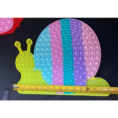 Jucarie antistres din silicon pop it now, Melc, 40 cm, Multicolor - vivimall.ro