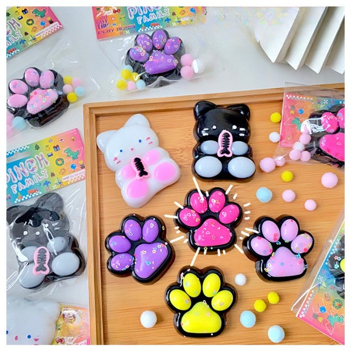 Jucarie Antistres Squishy, Vivimall, cu Revenire Lenta, Squeeze Pinch Family, Model Labuta de Pisica, 6.8x6.2 cm, 55g, Ambalaj Transparent, Roz Inchis - vivimall.ro