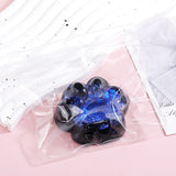 Jucarie Antistres Squishy, Vivimall, cu Revenire Lenta, Squeeze Pinch Family, Model Labuta de Pisica cu Sclipici, 6.5x6 cm, 60g, Ambalaj Transparent, Albastru-Negru - vivimall.ro