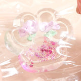 Jucarie Antistres Squishy, Flippy, Labuta de Pisica Pufoasa, cu Revenire Lenta, 7 x 6.5 cm, Model Flori 1, Transparent - vivimall.ro