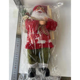 Figurina Decorativa Craciun, Vivimall, Mos Craciun cu Lemne la Brat, 30 x 17 x 10 cm, Material Plastic+Textil, Interior/Exterior, Rosu/Verde - vivimall.ro