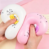 Jucărie antistres squishy Flippy pentru copii și adulți, model gogoașă cu ochi mari, vedere laterală