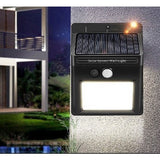 Lampa cu incarcare solara si senzor de miscare pentru exterior, 64 LED cu distanta de inductie, montaj pe perete, fara cabluri, Vivimall - vivimall.ro