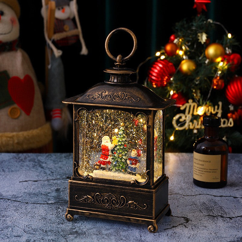 Felinar decorativ Moș Crăciun cu băiețel, model vintage negru-auriu, vedere frontală completă, 23 cm înălțime