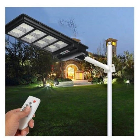 Lampa solara stradala Vivimall, cu telecomanda, senzor de miscare si lumina, suport prindere, 225 LED-uri, IP65, ABS, 15AH, 300W, temperatura culoare 6500K, 69.5x24.3x6.8 cm, autonomie 10-12 ore, negru - vivimall.ro