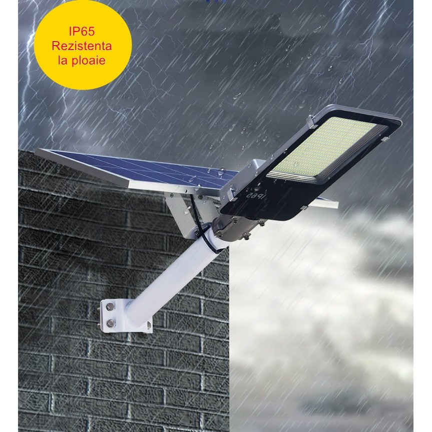 Lampa solara stradala Vivimall, pentru curte sau strada, finisaj lucios, rezistent la apa, montare prin fixare, senzor lumina, baterie de litiu, IP65, lumina rece, putere 500W, autonomie 10 ore, 49.5 x 21 x 9 cm, negru - vivimall.ro