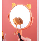 Oglina Cosmetica cu Picior, Vivimall, HD, Rotire 360 Grade, 15 cm Diametru, Suport Bijuterii Baza Rotunda + 2 Brate, Model cu Urechi, 31 x 14.5 x 15 cm, din Plastic, Portocaliu/Galben - vivimall.ro