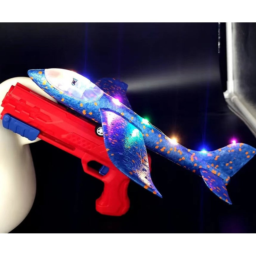 Pistol cu Lansator de Avion, Vivimall, din Polistiren+Plastic, +3 Ani, Avion 38 cm, Lansare 10 m, cu Lumini si Roti, Rosu/Albastru - vivimall.ro