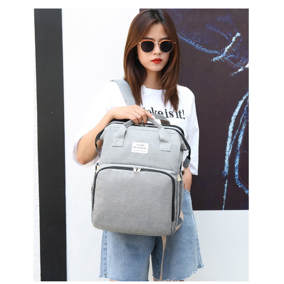 Rucsac Multifunctional pentru Mamici, Vivimall, cu Patut Pliabil si Baza de Schimbat, Rezistent la Apa, Capacitate Mare, Usor, Compartimente Multiple, Buzunar Termic pentru Lapte, 42 x 32 x 22 cm, Gri - vivimall.ro