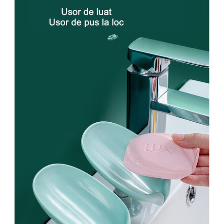 Savoniera Vivimall, cu scurgere, pentru sapun, cu ventuza, material ABS, 13 x 8.5 x 10.5 cm, albastru - vivimall.ro